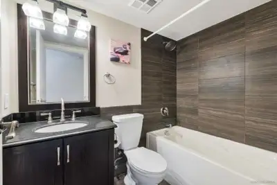 Room in a House close to Sky train. One furnished private room, just a few minutes walk to Bus stop....