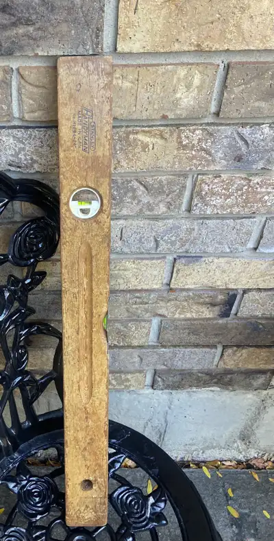 Vintage Stanley Handyman 24-inch wood level, perfect for various leveling tasks; this vintage tool i...