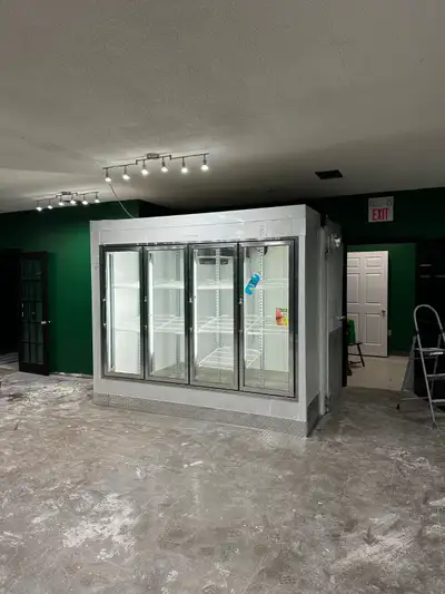 Custom built on the spot using pre-fabricated panels and glass doors with frames. Mike 647-863-5025...
