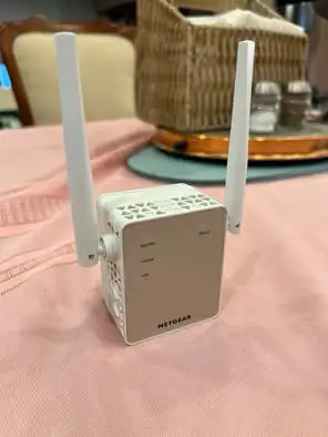 Slightly used Netgear WiFi Range Extender. Selling without the box. Cash and pick up only. Thank you...