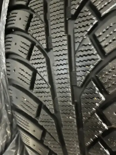 Almost new winter tires in new condition. Asking $120 for both obo.