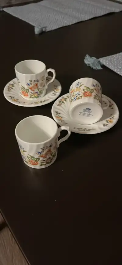 set of 12 Aynsley Cottage Garden teacups and saucers. Crafted in England, this fine bone china set f...