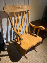 Solid oak glider rocker 