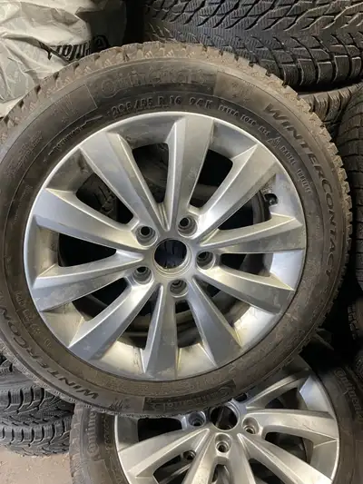 16” OEM VW Golf/Jetta wheels with 205-55-16 continental winter contact tires. In excellent condition...