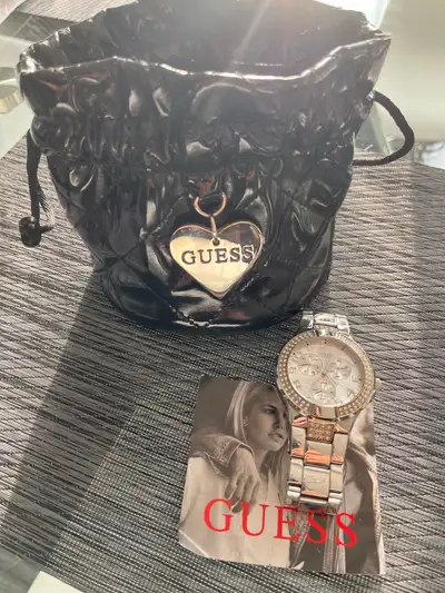 Women’s Silver AUTHENTIC GUESS Watch Purchased last year worn a few times needs a new battery comes...