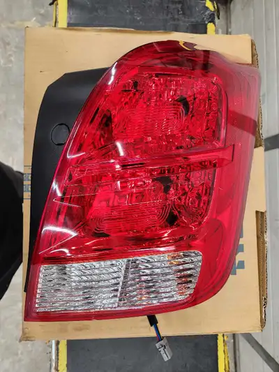 Chevy Trax Passenger Tail Light Assembly - brand new in box - plug and play wiring - bulbs included...