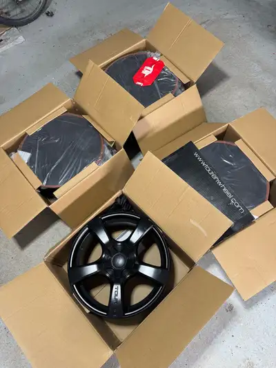 Description: Selling a set of 4 brand new 18” black rims, still in the original packaging – never mo...