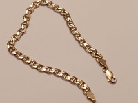 Yellow gold bracelet 10K ...7.5 inches. 6.0 grams. Width 4.6mm,