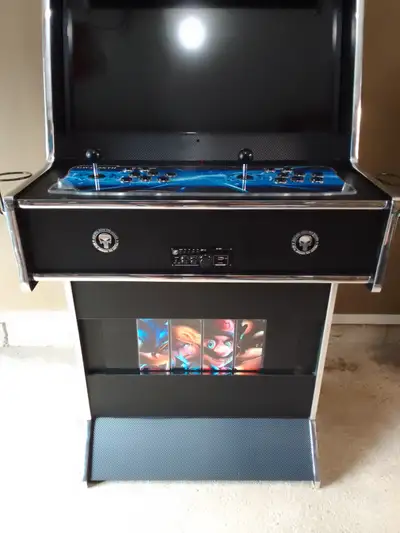 Arcade machine for sale $2000 obo Over 26 000 games, pacman, galaga, frogger, mario brothers, etc......