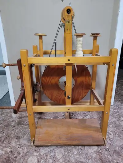 This glorious wheel was made between 1930 and 1946 in Sifton, Manitoba by a blacksmith named John We...