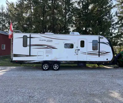 Trailer is in excellent condition and very clean has queen bed fold down couch bathroom has large sh...