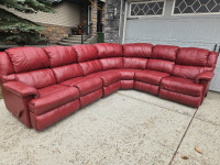 Free delivery/recliner leather sectional couch 