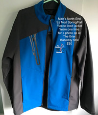NEW men’s outdoor jacket, got at Briar curling championship