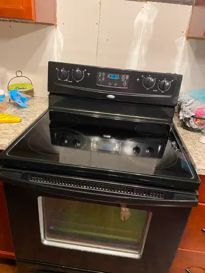 Black 30 inch whirlpool stove with self cleaning oven, View more