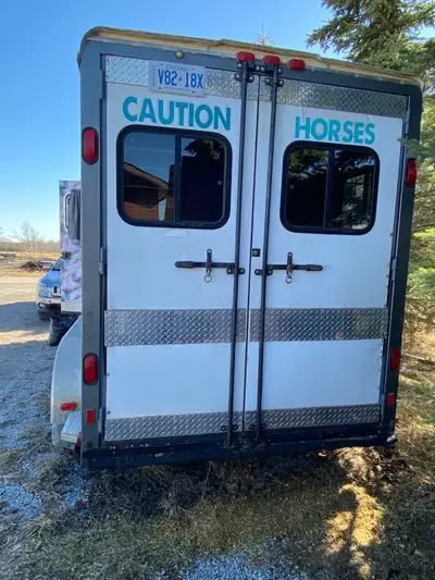 2 horse, gooseneck, step-up trailer, converted to a one horse plus living quarters. Comes with bar t...