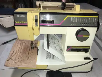 SINGER. heavyduty straight-zigzag & White Speedylock SERGER...., View more