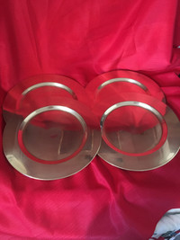 Four brass charger plates