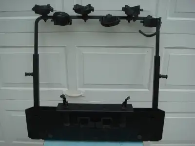 Gun Rack that fit unto the box of a Polaris Ranger. May fit other makes as well