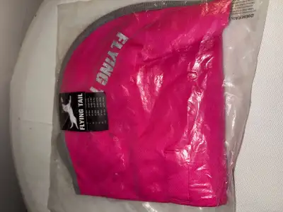 Keep your dog warm and stylish with this brand-new Flying Tail dog coat, size S/P, featuring a rever...