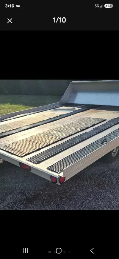 Ownership papers in my name... TRITON XL Double snowmobile trailer in close to brand new condition.....