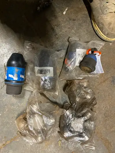 I am selling a collection of new old stock Moog chassis parts, including ball joints and U-joints, p...