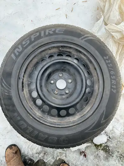 4 all season tires Sailun Inspire 225/65R17 102T 5 inches bolt pattern Mounted on used rims that are...