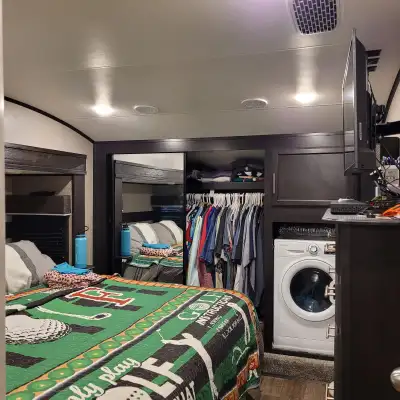 Skirting, hot water on demand, 5th wheel cover, washer/ dryer combo,king size bed, pull out sleeps 2...