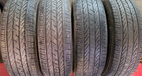 4 Bridgestone 225/65/17 All season used Tires 70% Tread 