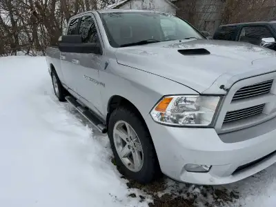 I am selling a very reliable Dodge Ram truck. It has black leather interior fully loaded with traile...