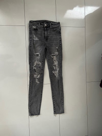 Grey wash AE ripped skinny jeans