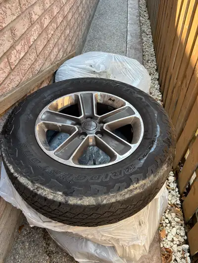 All five Original Bridgestone all seasonTires and rim off of jeep wrangler 2021. Rims are in good co...