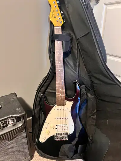 Left Handed Guitar & Peavey Amp, View more