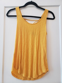 Bundle of two womens size small tops, yellow tank top and v-neck