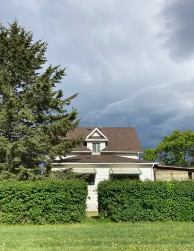 5.86 red deer county acreage fenced for horses 10 min west of red deer. 3 bedroom character 1.5 stor...