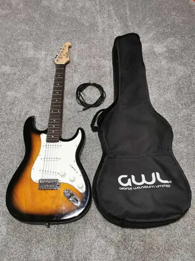 Excellent condition GWL electric guitar with cable for amp and bag. The bag is a bit frayed on the e...