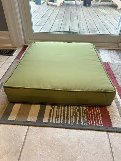 I'm selling a set of six outdoor seat cushions, each measuring about 20x20x4 inches, perfect for add...