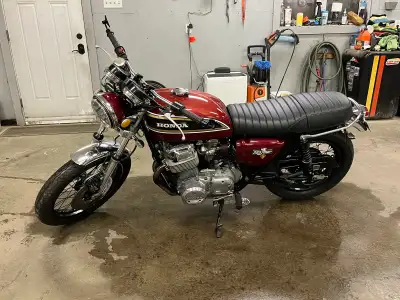 Beautifully restored 1977 CB750 K, maintaining Classic theme with lite Cafe racer mods. Tank and emb...