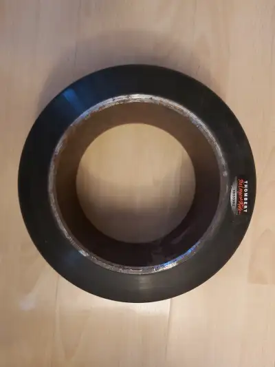 Forklift Tire. Manufacturer: THOMBERT TIRE, Part Number: 10333B2. Size: 12" X 5.5" X 8". This wheel...