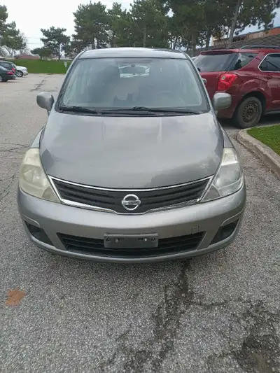 Hi im selling 2012 nissan versa 4 door huctch back LOW KM107200 NO RUST NEW BRAKES ROTER REAR AND FR...