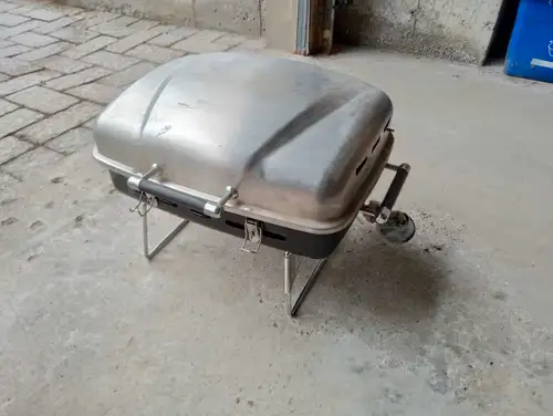 SS bbq portable grill.Approx. cooking area 18*13.5 inches. Collapsible legs.Like new.