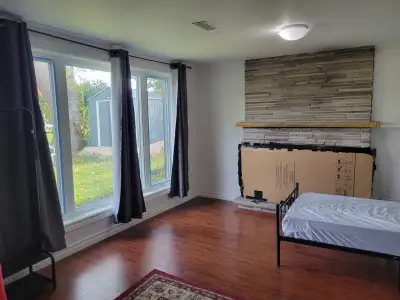 No lease required Month to month rent Separate Entrance Separate Laundry in basement Washroom in sha...