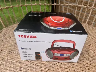 Red Toshiba TY-CWS9 (R) Portable Bluetooth wireless top loading CD player boombox; AM/FM stereo radi...