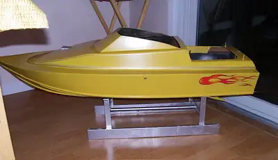 47" Deep "V" Hull, gas powered boat with 2 Channel remote control. Has been clocked at 35 MPH on the...
