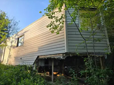 1976 Custom Travel Trailer Approx. 48 ft. Long, It needs 4 new tires and some work, but for the pric...