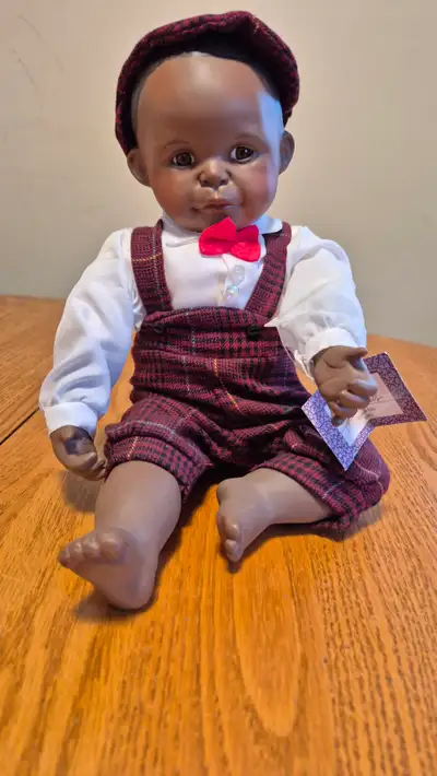 Ashton Drake Dolls are in mint condition. Dolls have always remained in curio cabinets,free from dus...