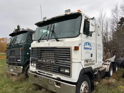White 1992 Mack Ultraliner with a 400 electronic Mack a 13 speed Mack transmission and Mack rear end...
