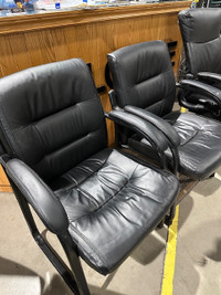 Pair Black Leather Chairs with padded arm, sled bottom