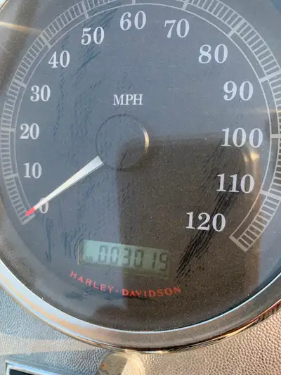 Mint condition,3500 original kms,heritage softtail classic,black and chrome,bags,backrest,96cc,lots...