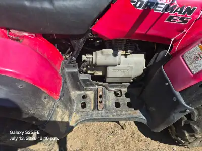 I have a 2002 honda 450 es for parts or repair runs but stuck between gears can't get it to neutral...