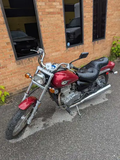 2009 Kawasaki Vulcan, has 10k. Was dropped on both sides as you can see the damage to the fuel tank...